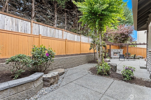 4569 162nd Ln SE, Bellevue, WA 98006 - fenced backyard with a patio area