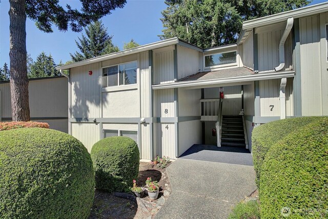 421 S 321st Pl Unit C4, Federal Way, WA 98003 - view of front of home featuring stairway and concrete driveway