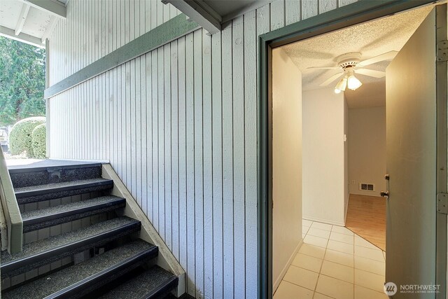 421 S 321st Pl Unit C4, Federal Way, WA 98003 - staircase with ceiling fan and tile patterned floors