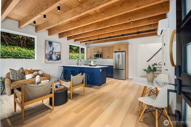 9694 51st Ave S, Seattle, WA 98118 - living area featuring light wood-style flooring, a wall unit AC, a wooden ceiling with exposed beams, and stairs