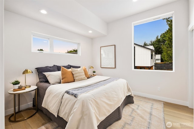 9694 51st Ave S, Seattle, WA 98118 - bedroom with recessed lighting and wood finished floors