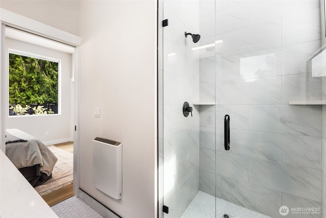 9694 51st Ave S, Seattle, WA 98118 - full bathroom with heating unit, a shower stall, and ensuite bath