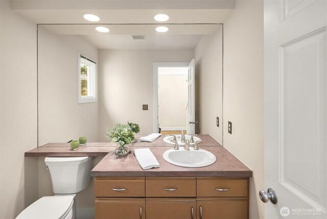 1732 Bellevue Way NE, Bellevue, WA 98004 - half bath featuring vanity and recessed lighting