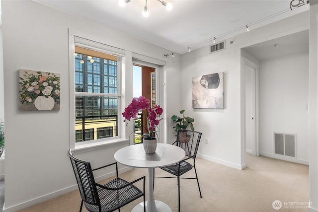 2607 Western Ave Unit 655, Seattle, WA 98121 - dining room with carpet flooring