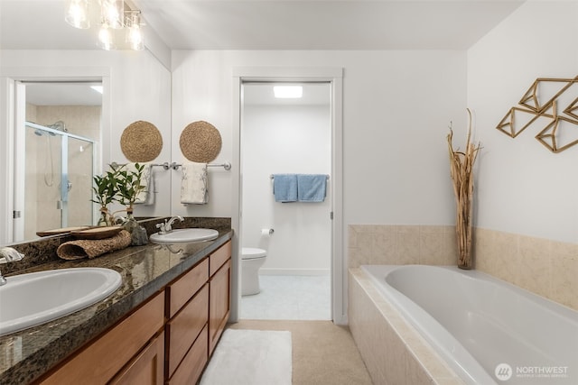 2607 Western Ave Unit 655, Seattle, WA 98121 - full bath with a bath, double vanity, and a shower stall