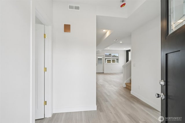 3102 44th Ave NE, Tacoma, WA 98422 - hallway featuring light wood finished floors, stairway, and recessed lighting