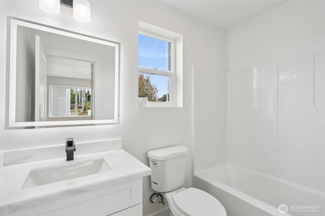3102 44th Ave NE, Tacoma, WA 98422 - bathroom featuring plenty of natural light, vanity, and bathtub / shower combination