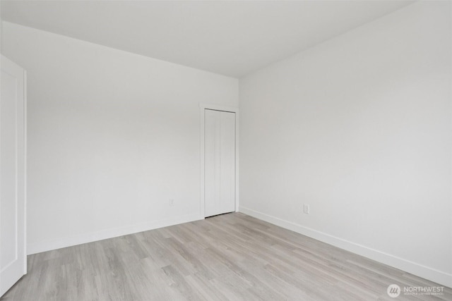 3102 44th Ave NE, Tacoma, WA 98422 - unfurnished room featuring light wood-type flooring and baseboards