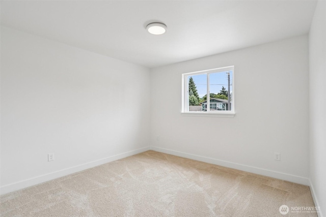3102 44th Ave NE, Tacoma, WA 98422 - empty room featuring carpet flooring and baseboards