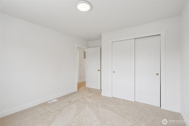3102 44th Ave NE, Tacoma, WA 98422 - unfurnished bedroom with light colored carpet and a closet