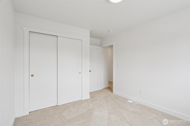 3102 44th Ave NE, Tacoma, WA 98422 - unfurnished bedroom with carpet flooring and a closet
