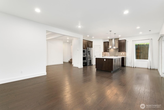 4214 223rd Pl SE, Bothell, WA 98021 - unfurnished living room featuring dark wood-style flooring and recessed lighting