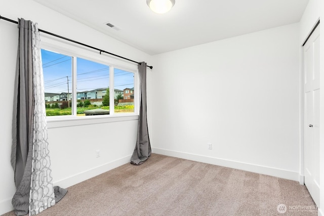 4214 223rd Pl SE, Bothell, WA 98021 - unfurnished bedroom featuring light carpet and a closet