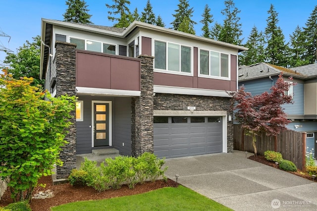 4214 223rd Pl SE, Bothell, WA 98021 - contemporary house with stone siding, driveway, a garage, and a balcony