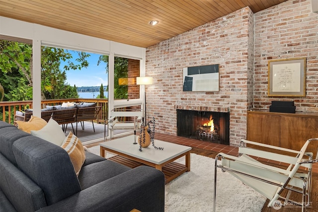 4148 Boulevard Pl, Mercer Island, WA 98040 - living room featuring wood ceiling, a water view, a fireplace, and wood finished floors