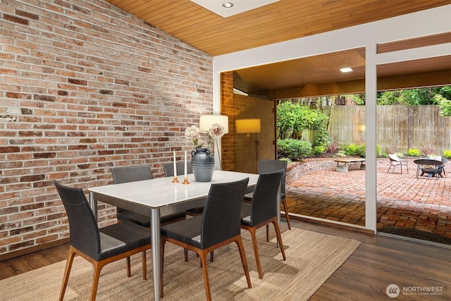 4148 Boulevard Pl, Mercer Island, WA 98040 - dining space featuring brick wall and wood ceiling