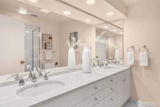 4148 Boulevard Pl, Mercer Island, WA 98040 - full bath featuring double vanity, recessed lighting, and a shower with shower door