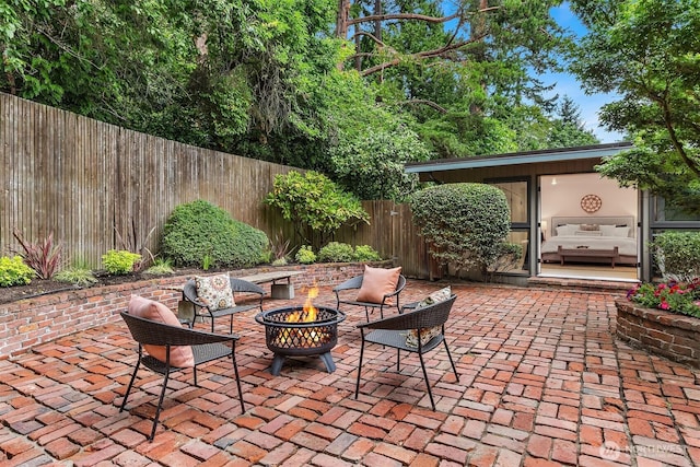 4148 Boulevard Pl, Mercer Island, WA 98040 - view of patio / terrace with an outdoor fire pit