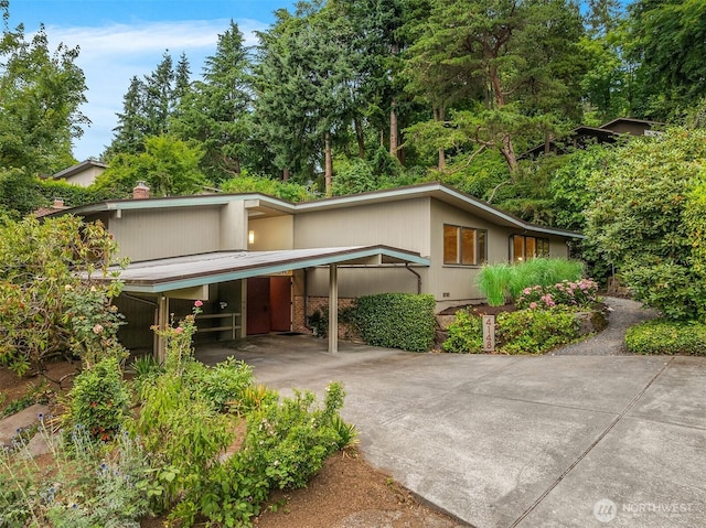 4148 Boulevard Pl, Mercer Island, WA 98040 - mid-century modern home with a carport and concrete driveway