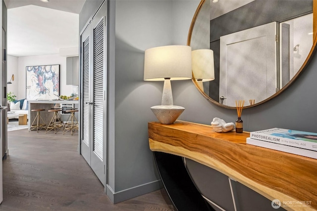 2510 6th Ave Unit 2809, Seattle, WA 98121 - home office featuring dark wood-style flooring and baseboards