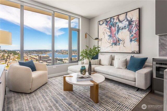 2510 6th Ave Unit 2809, Seattle, WA 98121 - living area with plenty of natural light and wood finished floors