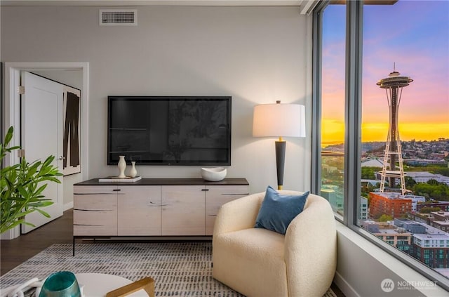 2510 6th Ave Unit 2809, Seattle, WA 98121 - living area featuring wood finished floors and healthy amount of natural light