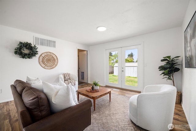 6819 Braker Way, Lynden, WA 98264 - living room featuring french doors and wood finished floors