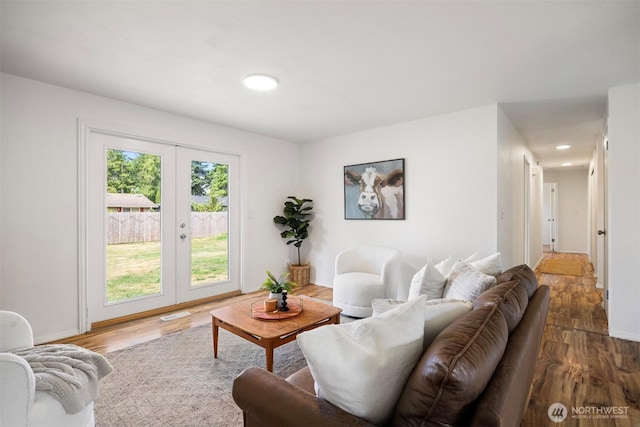 6819 Braker Way, Lynden, WA 98264 - living area with french doors, wood finished floors, and recessed lighting
