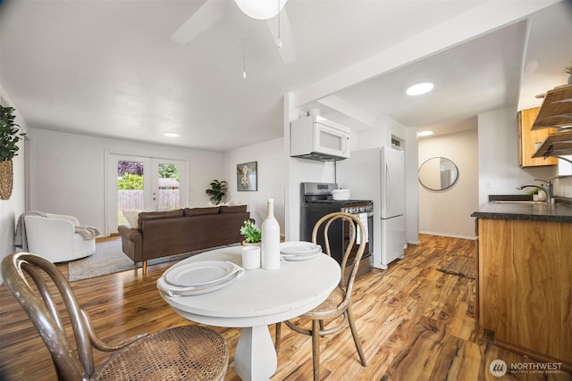 6819 Braker Way, Lynden, WA 98264 - dining space featuring light wood-type flooring, recessed lighting, and a ceiling fan
