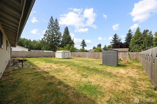 6819 Braker Way, Lynden, WA 98264 - fenced backyard featuring a storage shed