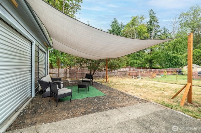 900 Dundee Rd NW, Olympia, WA 98502 - fenced backyard featuring a patio area