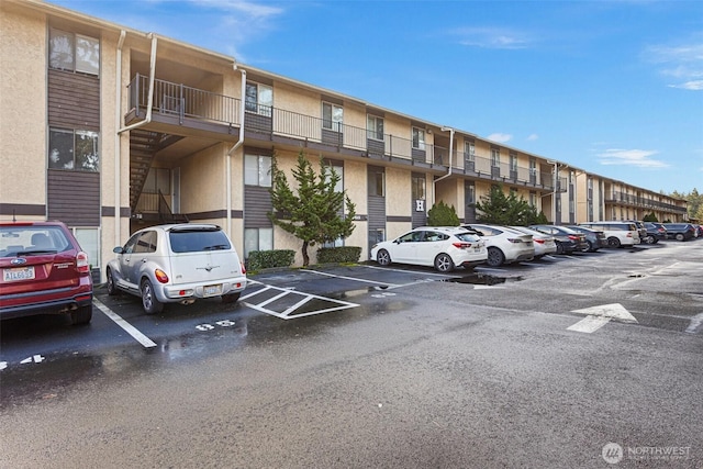 14510 124th Ave NE Unit H79, Kirkland, WA 98034 - view of apartment building / complex with uncovered parking