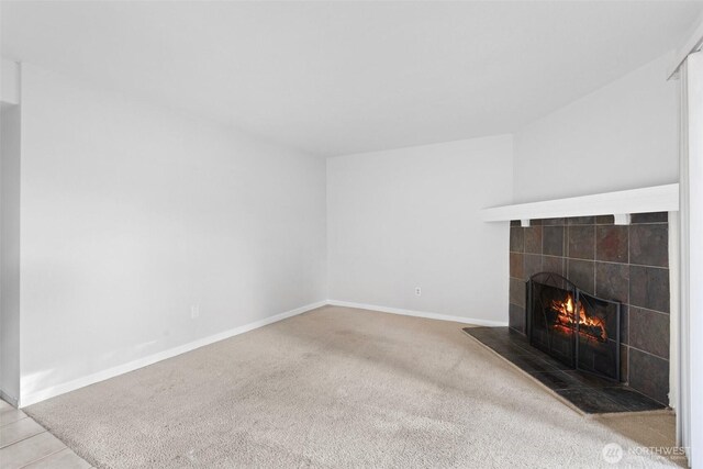 14510 124th Ave NE Unit H79, Kirkland, WA 98034 - unfurnished living room with a fireplace and carpet