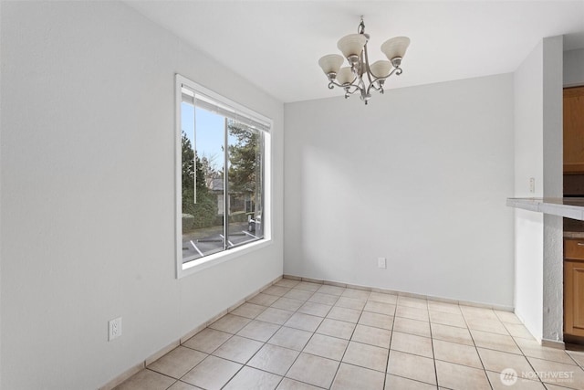 14510 124th Ave NE Unit H79, Kirkland, WA 98034 - unfurnished dining area with a chandelier and light tile patterned floors