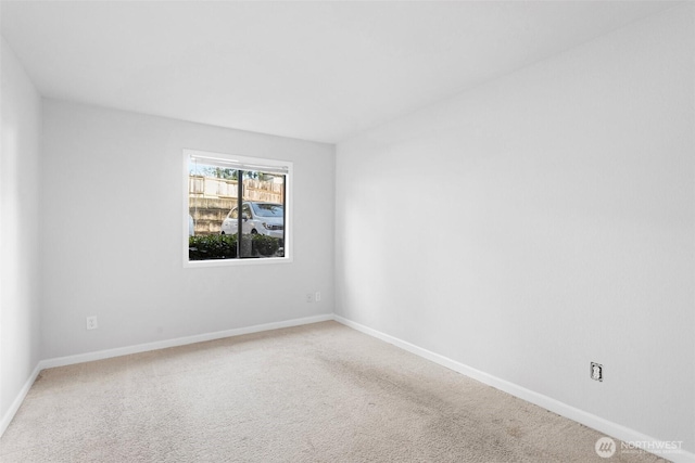 14510 124th Ave NE Unit H79, Kirkland, WA 98034 - carpeted spare room featuring baseboards