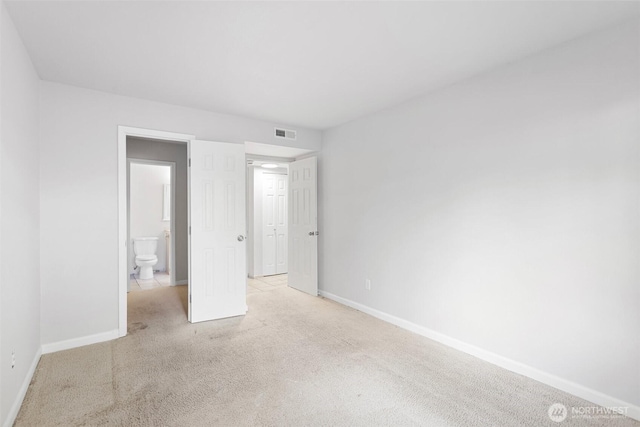 14510 124th Ave NE Unit H79, Kirkland, WA 98034 - unfurnished bedroom with light colored carpet and baseboards