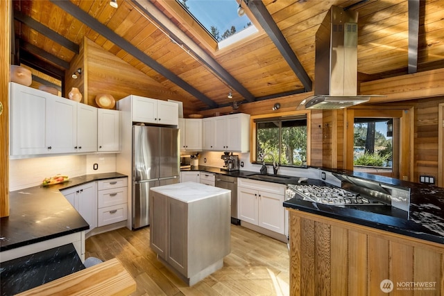 512 Broken Point Rd, Shaw Island, WA 98286 - kitchen with appliances with stainless steel finishes, wood ceiling, extractor fan, a skylight, and white cabinetry