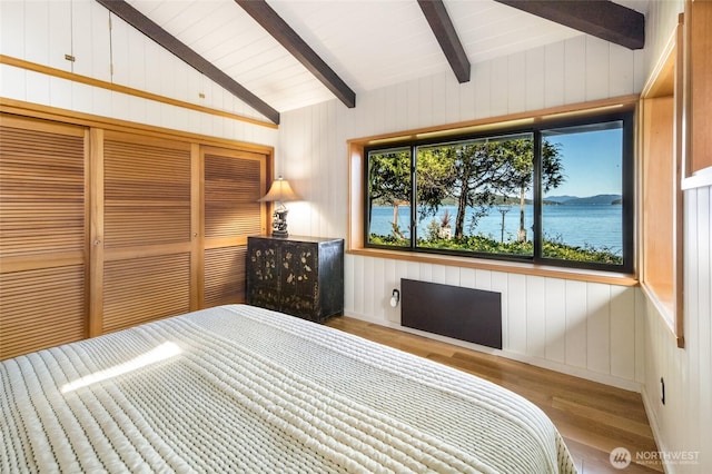 512 Broken Point Rd, Shaw Island, WA 98286 - bedroom featuring wood finished floors, a closet, and wooden walls