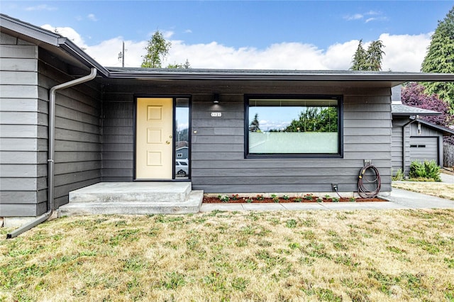 1121 W 12th St, Port Angeles, WA 98363 - property entrance featuring a yard