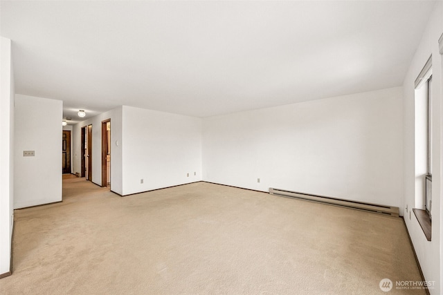 516 S 222nd St Unit 4, Des Moines, WA 98198 - empty room with baseboard heating and light carpet