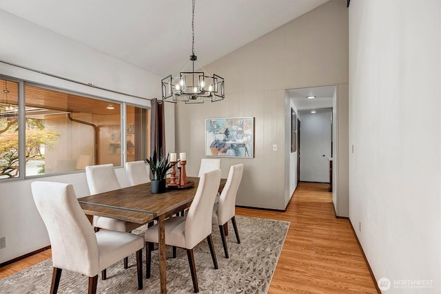 15025 SE 22nd St, Bellevue, WA 98007 - dining area featuring vaulted ceiling, light wood-type flooring, and a chandelier