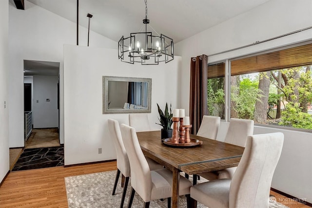 15025 SE 22nd St, Bellevue, WA 98007 - dining area featuring a chandelier, vaulted ceiling, and light wood finished floors