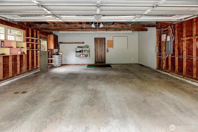 15025 SE 22nd St, Bellevue, WA 98007 - garage featuring a garage door opener, electric panel, and water heater