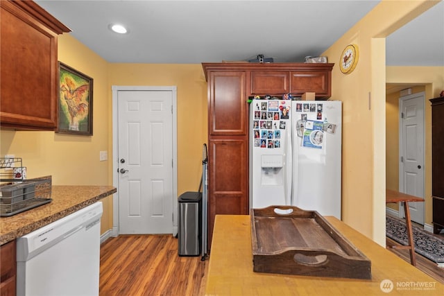 658 Okanogan Ave, Wenatchee, WA 98801 - kitchen featuring white appliances, wood finished floors, and recessed lighting