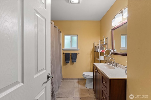 658 Okanogan Ave, Wenatchee, WA 98801 - full bathroom featuring vanity, tile patterned floors, and curtained shower