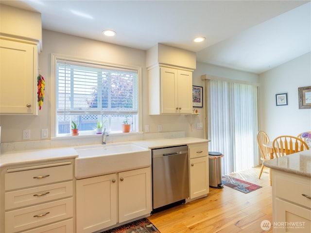 501 Summer Breeze Ln, Sequim, WA 98382 - kitchen featuring stainless steel dishwasher, light wood finished floors, light countertops, white cabinets, and recessed lighting