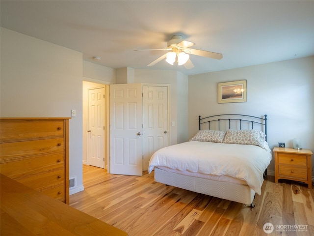501 Summer Breeze Ln, Sequim, WA 98382 - bedroom featuring light wood finished floors, ceiling fan, and a closet