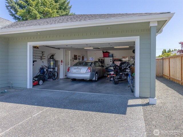 501 Summer Breeze Ln, Sequim, WA 98382 - garage with driveway and strapped water heater