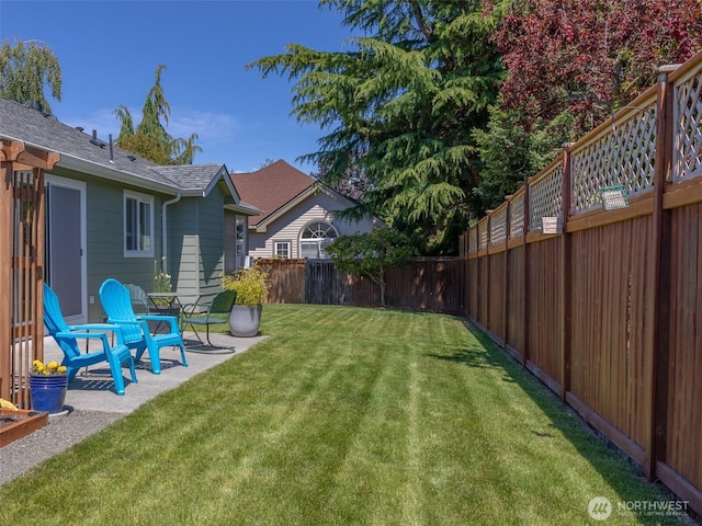 501 Summer Breeze Ln, Sequim, WA 98382 - fenced backyard featuring a patio area