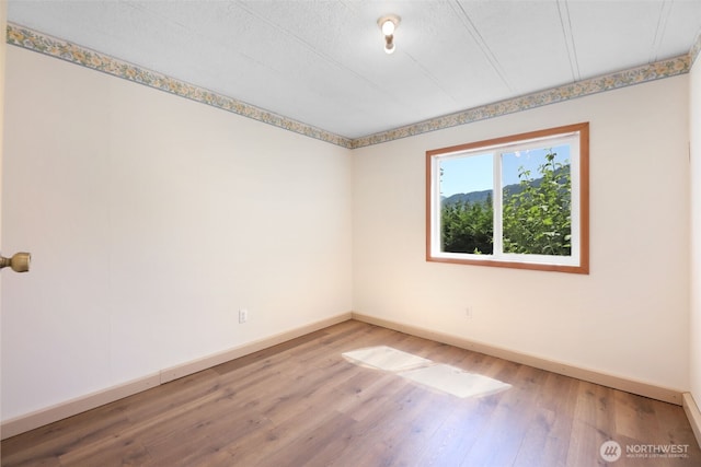 15932 427th Ave SE, Gold Bar, WA 98251 - empty room with wood finished floors